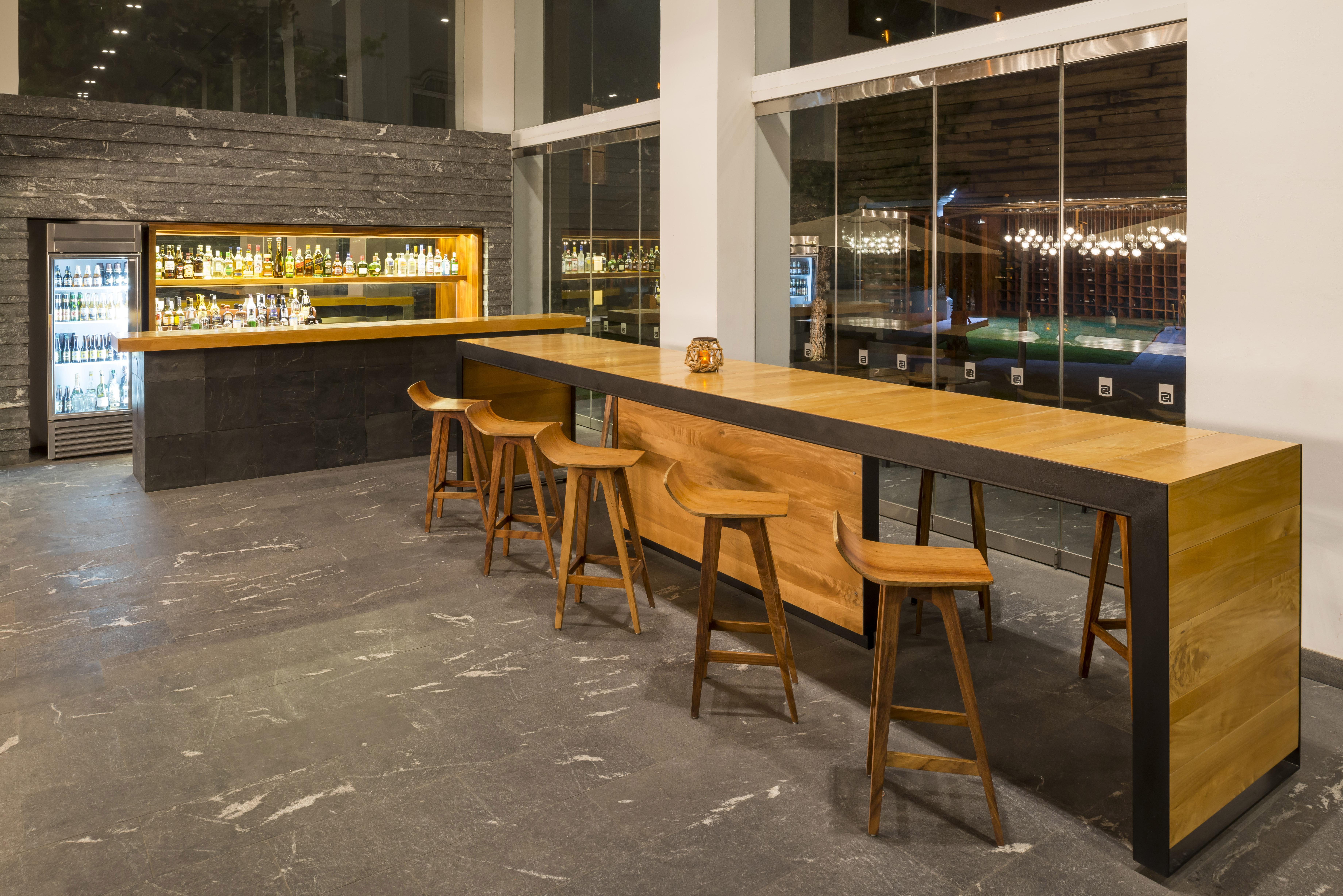 普埃布拉安吉罗波利斯卡米奥真实酒店 外观 照片 The bar at the 10000 km lounge
